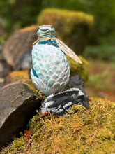 Load image into Gallery viewer, Pearly white dragon egg potion bottle with opalescent silver shimmer liquid activated