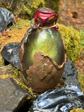 Load image into Gallery viewer, Back view of bronze-brown dragon egg showing sculpted scale texture
