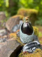 Load image into Gallery viewer, Black and dark green dragon egg potion bottle on handwritten rice paper lore sheet
